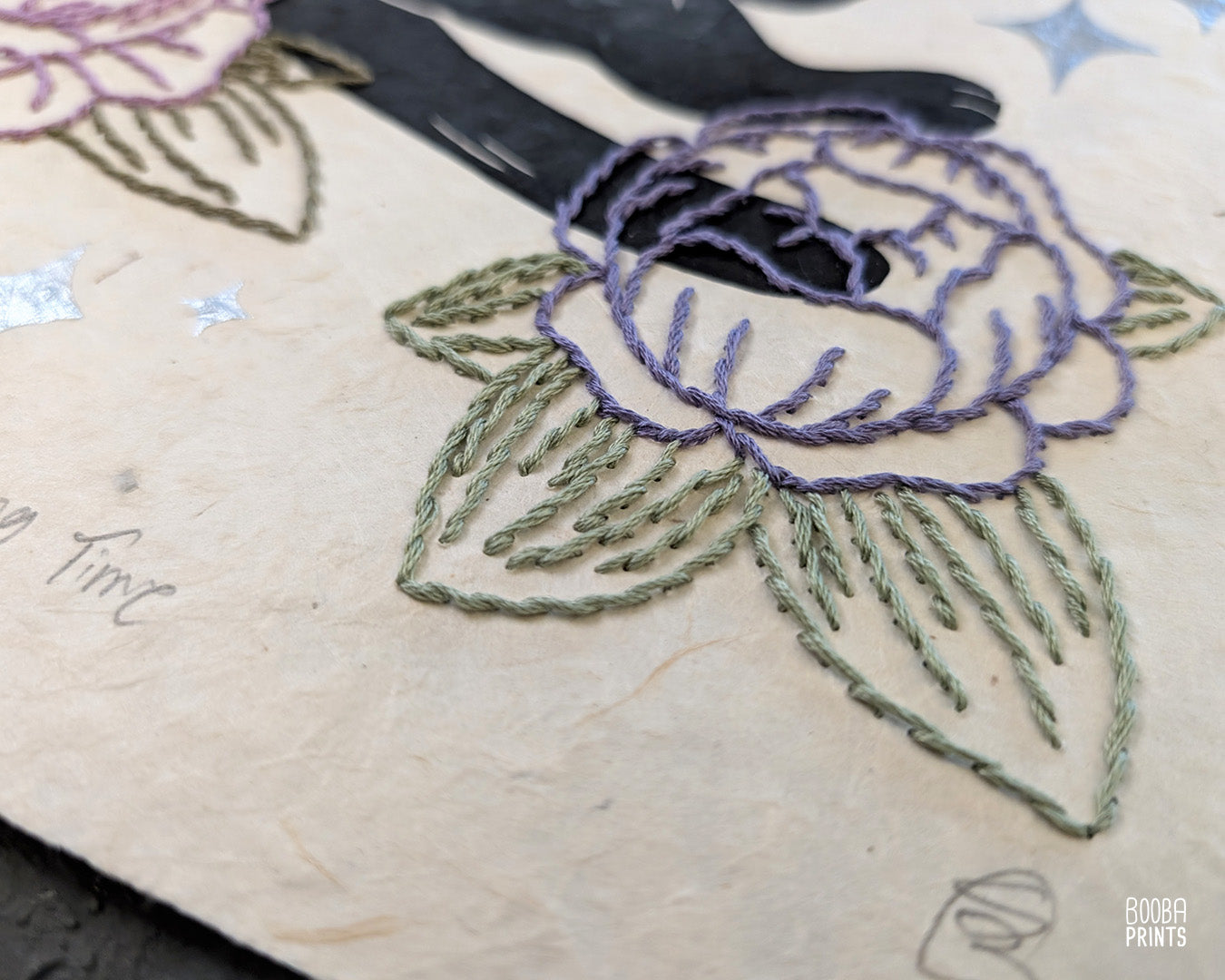 Original hand printed and hand embroidered linocut print. "Cat In Spring Time" is a linocut print, printed by hand, featuring a sleepy black cat, surrounded by  hand embroidered flowers and metallic stars. Print is available in 2 version. A unique original mixed media art piece for cat lovers. Beautiful special gift for your cat loving friend. Cat art wall by Booba Prints.