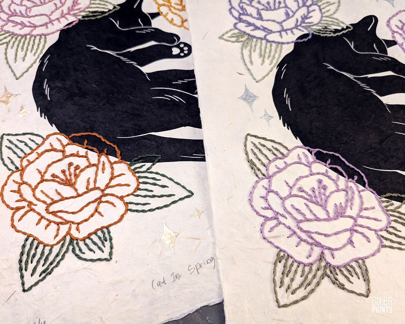 Original hand printed and hand embroidered linocut print. "Cat In Spring Time" is a linocut print, printed by hand, featuring a sleepy black cat, surrounded by  hand embroidered flowers and metallic stars. Print is available in 2 version. A unique original mixed media art piece for cat lovers. Beautiful special gift for your cat loving friend. Cat art wall by Booba Prints.
