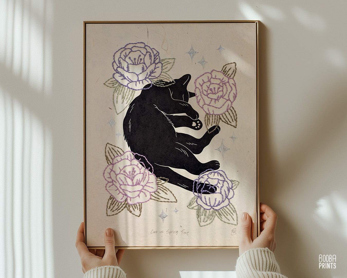 Original hand printed and hand embroidered linocut print. "Cat In Spring Time" is a linocut print, printed by hand, featuring a sleepy black cat, surrounded by  hand embroidered flowers and metallic stars. Print is available in 2 version. A unique original mixed media art piece for cat lovers. Beautiful special gift for your cat loving friend. Cat art wall by Booba Prints.