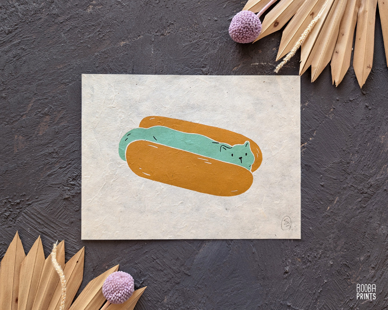 Original 2 color linocut print, printed in Ochre and mint green, showing a cute cat in a hot dog but. Cute whimsical art for your kitchen. Art by Booba Prints