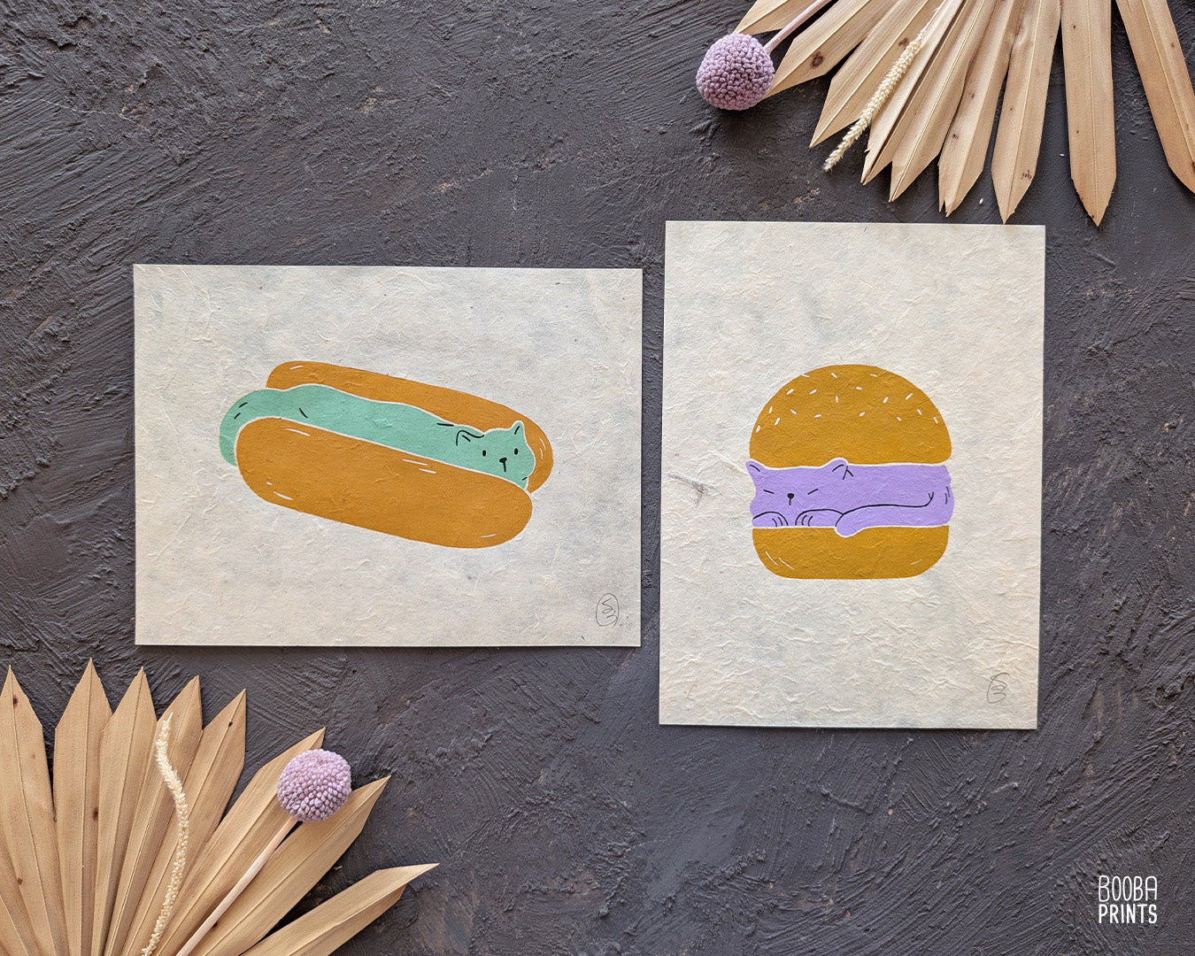 Original 2 color linocut print, printed in Ochre and mint green, showing a cute cat in a hot dog but. Cute whimsical art for your kitchen. Art by Booba Prints