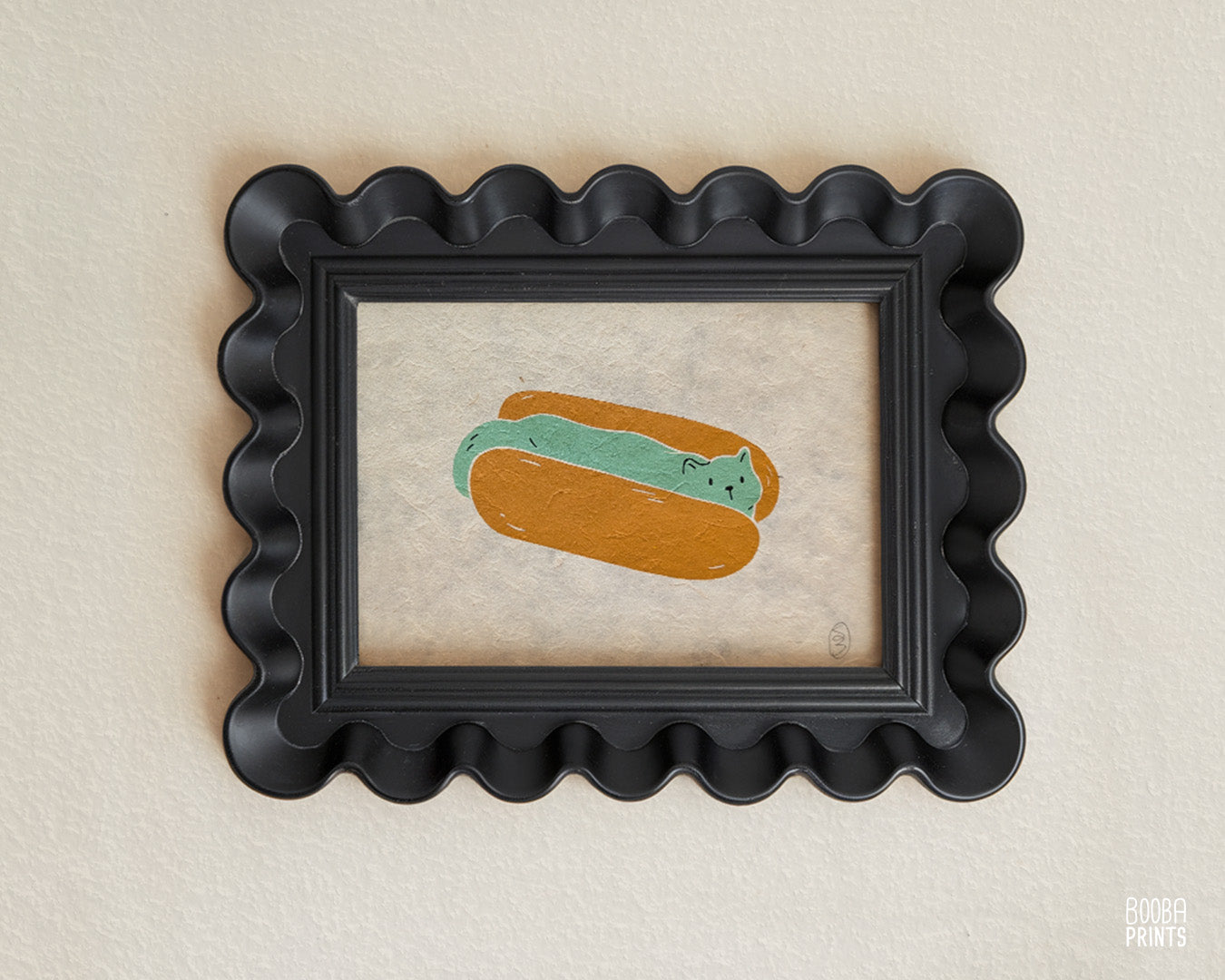 Original 2 color linocut print, printed in Ochre and mint green, showing a cute cat in a hot dog but. Cute whimsical art for your kitchen. Art by Booba Prints