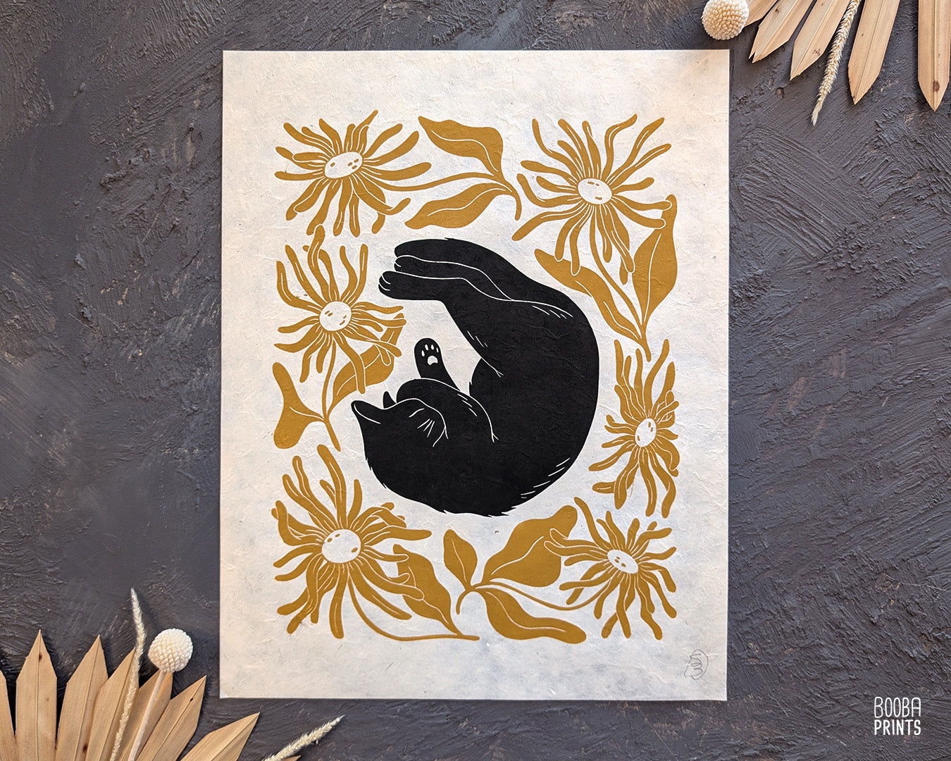 Original handmade linocut "Shy Cat" print. Featuring a cute black cat, covering his face while sleeping, and surrounded by flowers in Ochre yellow. Printed by hand with oil based ink. Original artwork for cat lover, gift for cat lover. A print from the series - "Cats and Plants" by Booba Prints.