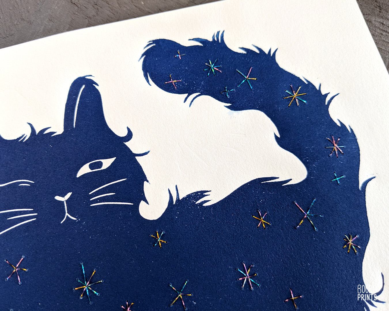 Handmade linocut print of Scruffy Cat, Daytime cat, printed by hand in navy blue ink and finished with hand embroidery. Cat lover gift. Super Seconds Festival, online festival where I sell seconds and samples in reduced prices. Grab a bargain. Art by Booba Prints