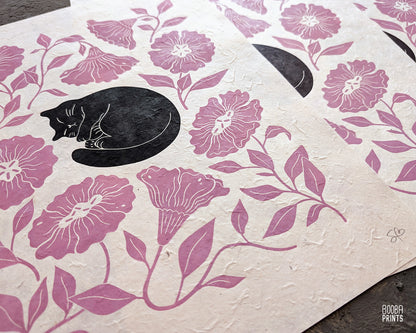 Handmade linocut print of Sleeping Black Cat & Pink Flowers, cat lover print, cat print for home decor and gallery wall. Art by Booba Prints