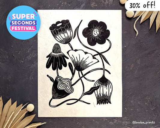 Handmade linocut print of floral composition. flower print in black and white on white or off white paper. black and white print, handmade original print for home decor and gallery wall. original artwork by Booba Prints. Super Seconds Festival, sale of samples and seconds, discounted print, online UK based festival.