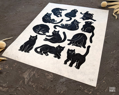 Original handmade linocut print of 12 black cats, cute print on natural lokta paper or STUNNING pink Himalayan paper, cat lover print, print for home decor and gallery wall, add this to your space to spark joy and get inspired. Print by Booba Prints