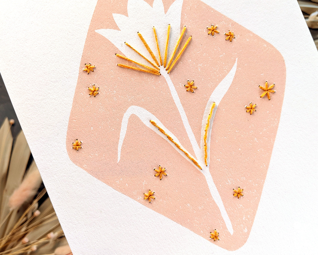 Handmade linocut embroidered print. Pink peachy flower print printed with oil based ink and finished with embroidery floss. Super Seconds Festival sale. Discounted print 40% off. Art by Booba Prints.