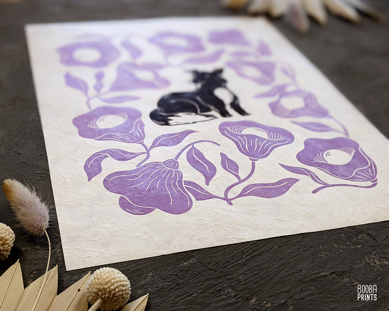 Original handmade linocut print of Happy Dog & Purple Flowers. 2 color hand printed design, printed by hand with black and purple ink on natural Lokta paper 50 gsm, dog lover gift, cute dog print, birthday or housewarming gift, flower lover and dog lover gift. Art by Booba Prints