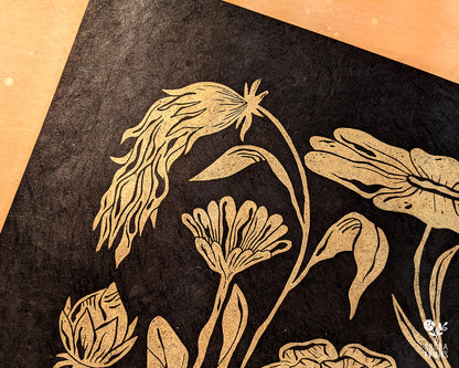 Handmade and original linocut floral print. Floral composition printed in metallic gold on black Lokta paper. Flower love gift. Floral print by Booba Prints. Print for home decoration and gallery wall. Decor lover gift. Art by Booba Prints