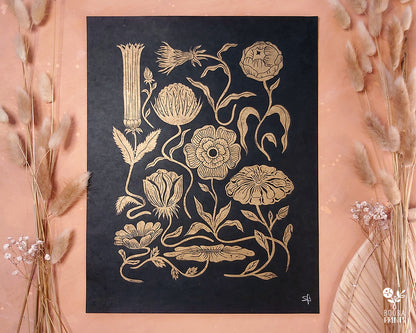 Handmade and original linocut floral print. Floral composition printed in metallic gold on black Lokta paper. Flower love gift. Floral print by Booba Prints. Art by Booba Prints