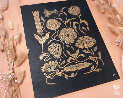 Handmade and original linocut floral print. Floral composition printed in metallic gold on black Lokta paper. Flower love gift. Floral print by Booba Prints. Art by Booba Prints