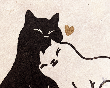 Handmade original linocut print of Snuggly Cats. Perfect Valentine's Day gift or an anniversary gift. Printed with black oil based ink on natural Lokta paper 55 gsm. finished with gold or lavender heart. 2 color print for cat lovers. Print for home decorations. 8x10 inches print. Art by Booba Prints.