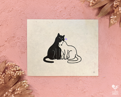 Handmade original linocut print of Snuggly Cats. Perfect Valentine's Day gift or an anniversary gift. Printed with black oil based ink on natural Lokta paper 55 gsm. finished with gold or lavender heart. 2 color print for cat lovers. Print for home decorations. 8x10 inches print. Art by Booba Prints.