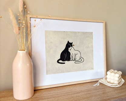 Handmade original linocut print of Snuggly Cats. Perfect Valentine's Day gift or an anniversary gift. Printed with black oil based ink on natural Lokta paper 55 gsm. finished with gold or lavender heart. 2 color print for cat lovers. Print for home decorations. 8x10 inches print. Art by Booba Prints.