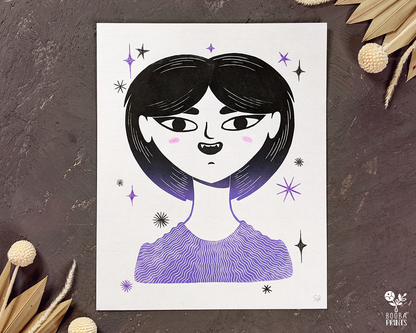 Original handmade and hand printed linocut print of Vampire Girl. Mixed media original piece of a woman vampire surrounded by stars. Printed with a 2 color gradient of black and purple, and finished with colored pencils with black and orange. Printed with oil based ink on Lokta paper 55 gsm. Whimsical art for home decor. Modern woman portrait. Art by Booba Prints. 
